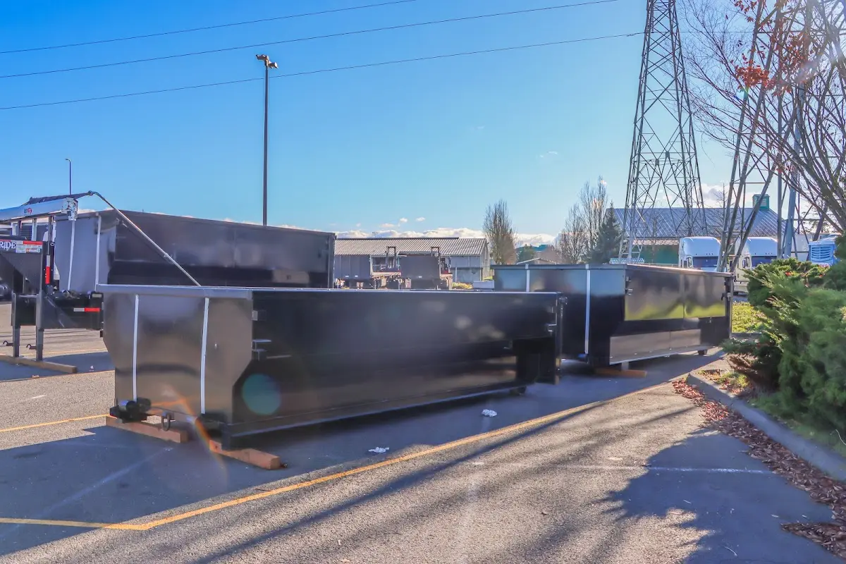 Roll-off dumpster ready for waste disposal at job site for 12 Yard Dumpster Rental in Stratford